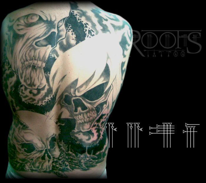 Backpiece Tattoo black and grey